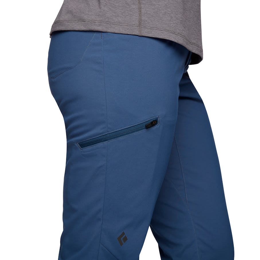 Detail shot of the W Technician Alpine Pants in Ink Blue showing the zippered thigh pocket